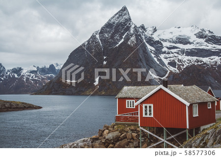 Norway rorbu houses and mountains rocks over fjord landscape scandinavian travel view Lofoten Norway rorbu houses and mountains rocks over fjord landscape scandinavian travel view Lofoten 58577306