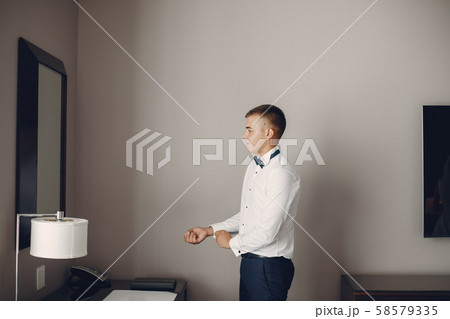 Man in a suit Man in a suit 58579335