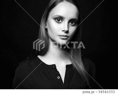 beautiful girl over black background. young woman beautiful girl over black background. young woman 58581555