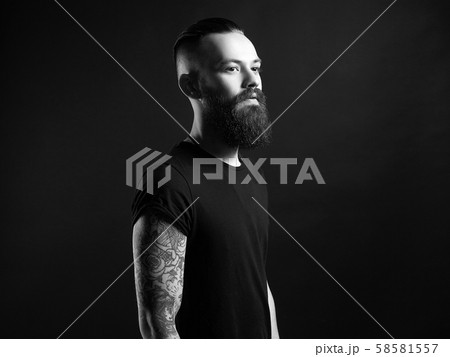 Boy with stylish haircut and tattoo. black and Boy with stylish haircut and tattoo. black and 58581557
