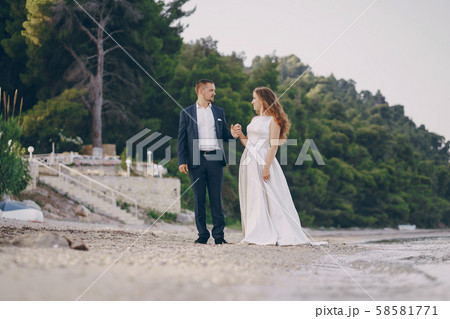 grooms in nature 58581771