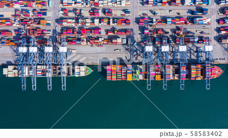 Container cargo ship loading in a port, Aerial Container cargo ship loading in a port, Aerial 58583402