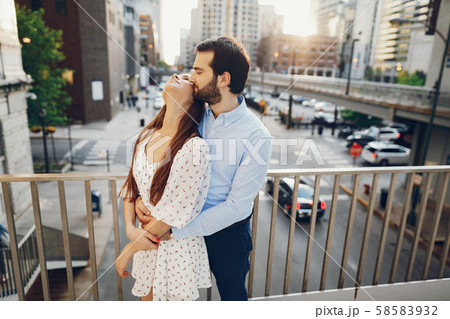 elegant couple in a city elegant couple in a city 58583932