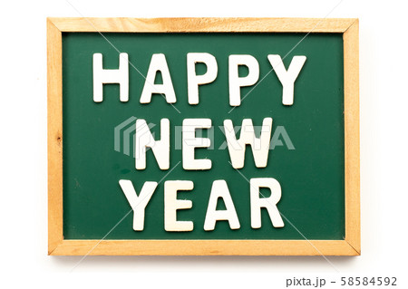Letter in word happy new year on blackboard in white background Letter in word happy new year on blackboard in white background 58584592