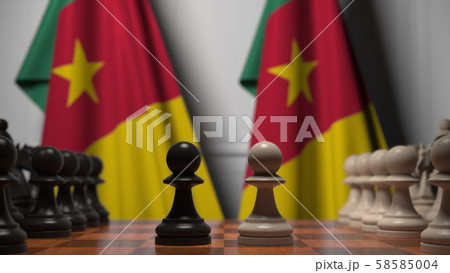 Chess game against flags of Cameroon. Political competition related 3D rendering Chess game against flags of Cameroon. Political competition related 3D rendering 58585004
