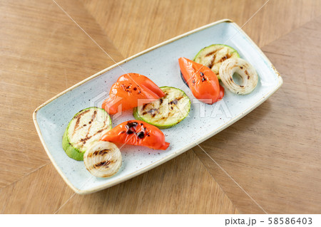 Grilled vegetables. Various side dishes in the restaurant menu Grilled vegetables. Various side dishes in the restaurant menu 58586403