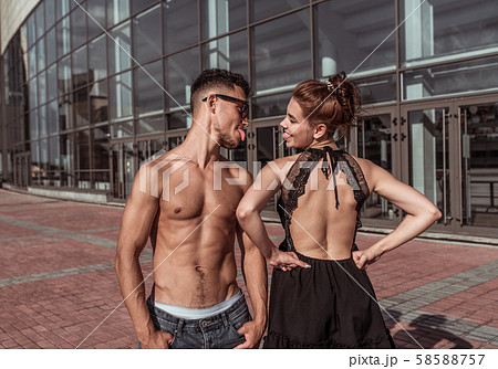 Young couple, guy girl, happy, smiling, play show languages each other, dancers, actors break dance 58588757