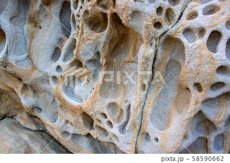 background and texture of mountain layers and cracks in sedimentary Cliff of rock mountain. 58590662