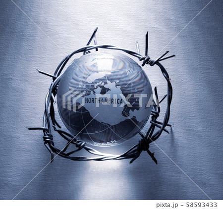 Globe wrapped in barb wire 58593433