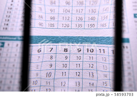 Magnifying glass and calendar 58593703