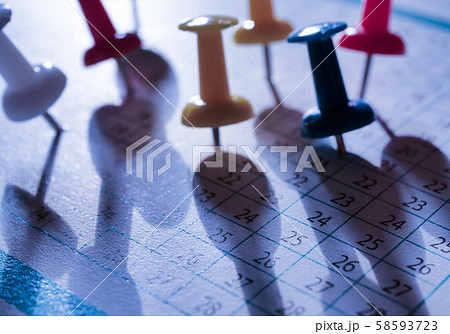 Push pins on paper 58593723