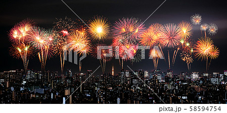 Fireworks over Tokyo cityscape at night, Japan Fireworks over Tokyo cityscape at night, Japan 58594754