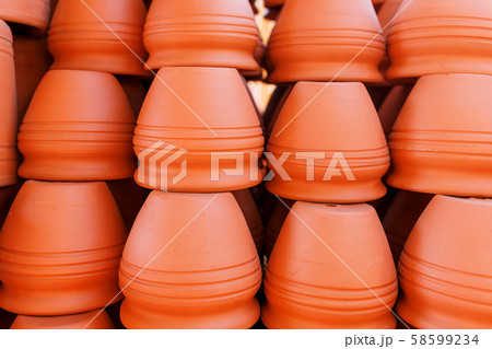 Handmade ceramic crockery made of clay of brown 58599234