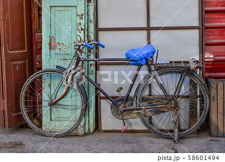 Old bicycle on street 58601494