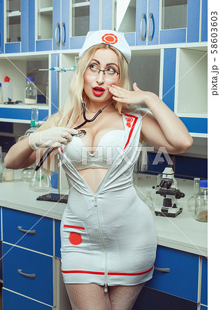 Sexy nurse with big breasts in hospital. - Stock Photo [58603603] - PIXTA