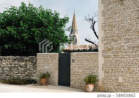 Picturesque street in village in the Island of Re 58603862