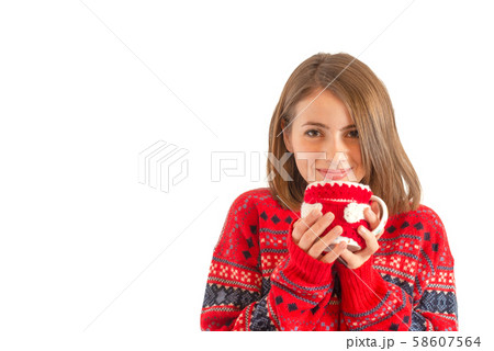 beautiful gril dressed like Santa with a tea cup beautiful gril dressed like Santa with a tea cup 58607564