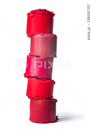 Sliced lipstick pieces stacked together isolated on a white background Sliced lipstick pieces stacked together isolated on a white background 58608702