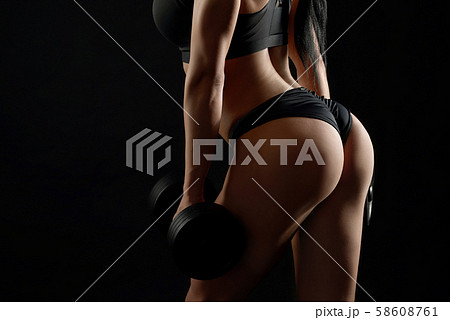 Female muscular body and sexy buttocks. 58608761