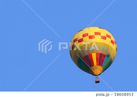 Colorful hot air balloon isolate on blue sky 58608953