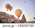 Cappadocia hot air balloon at sunrise 58609780