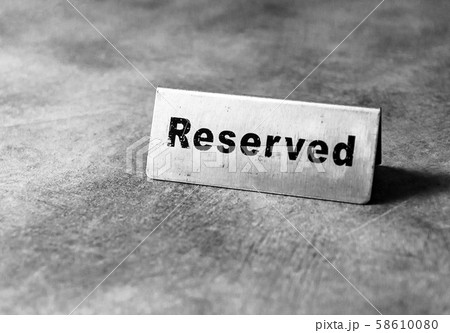 Reserved table sign in restaurant, silver reserved Reserved table sign in restaurant, silver reserved 58610080