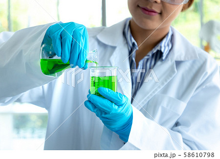 chemist scientis female doing experiments and 58610798