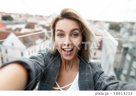 Happy young beautiful business woman  58613233