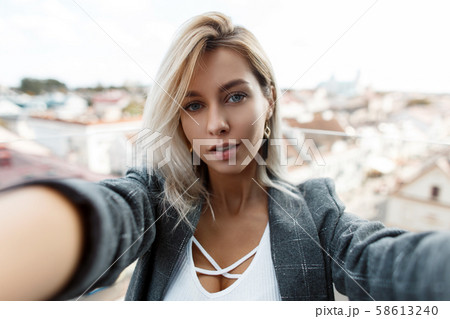 Beautiful stylish young woman  58613240