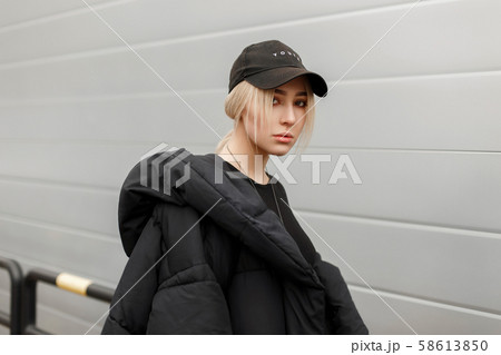 Stylish beautiful young girl 58613850