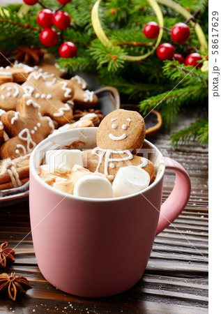 Pink mug with hot chocolate marshmallows and Pink mug with hot chocolate marshmallows and 58617629