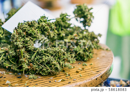 cannabis sativa dried marijuana closeup on table cannabis sativa dried marijuana closeup on table 58618083