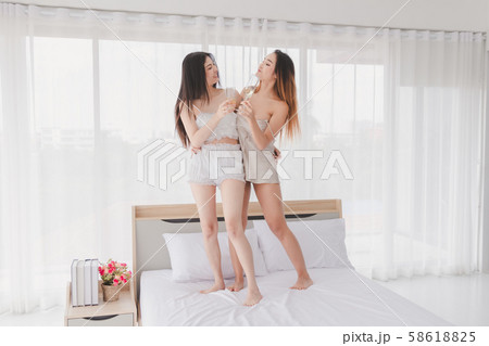 Parties pajamas girls concept. Women in pajamas Parties pajamas girls concept. Women in pajamas 58618825