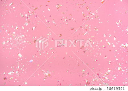 Pearl confetti on pink background. Pearl confetti on pink background. 58619591