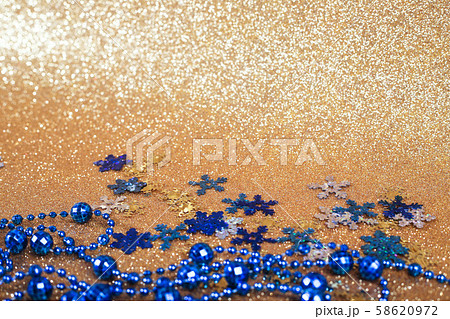 Christmas balls on gold glitters 58620972