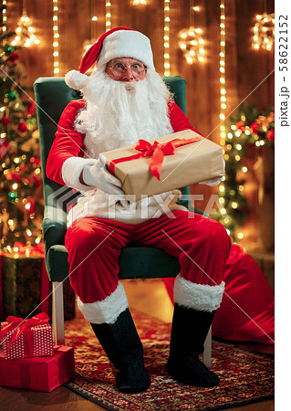 Photo of happy Santa Claus in eyeglasses looking at camera 58622152
