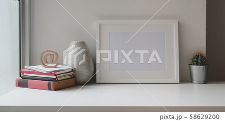 Comfortable workspace with mock up frame, office Comfortable workspace with mock up frame, office 58629200