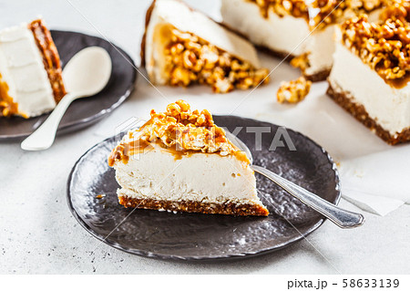Raw vegan cashew cheesecake with caramel popcorn. 58633139