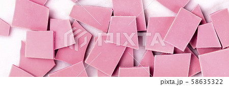 A panorama of ruby chocolate, overhead shot on a white marble background 58635322