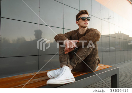 Fashionable handsome hipster man model  58636415