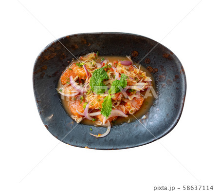 Top view of Thai spicy salmon salad on dark plate 58637114