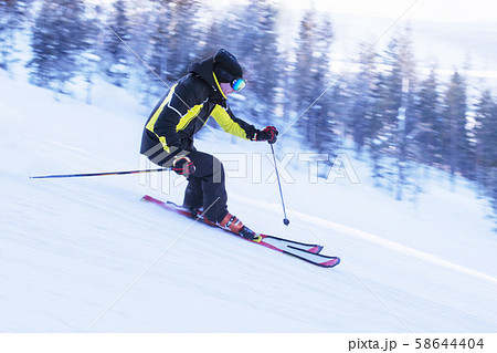 Skier in mountains 58644404