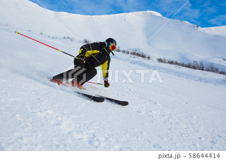 Skier in mountains 58644414