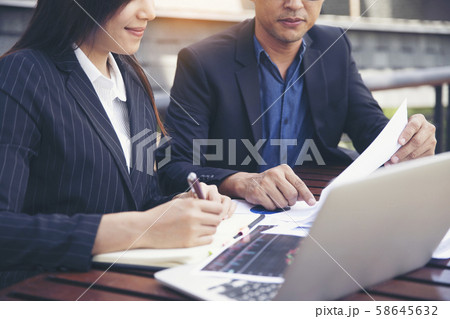 Business women are getting advice about business strategies or laws 58645632