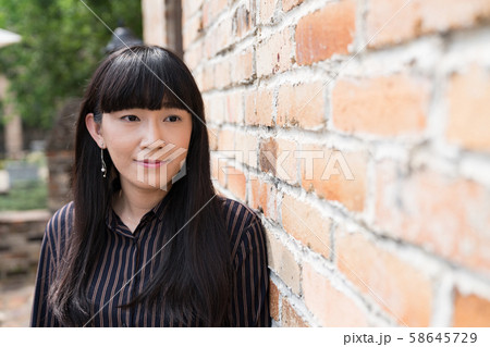An Asian woman in a village in Taichung, Taiwan. 58645729