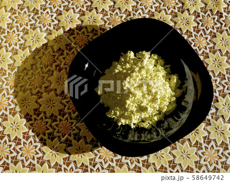 Plate with natural rustic cottage cheese. Farm natural dairy products. Products for vegetarians, vegans, pescaritans, flexitarians. 58649742