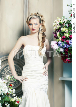 beauty young bride alone in luxury vintage interior with a lot of flowers, makeup and creative beauty young bride alone in luxury vintage interior with a lot of flowers, makeup and creative 58650194