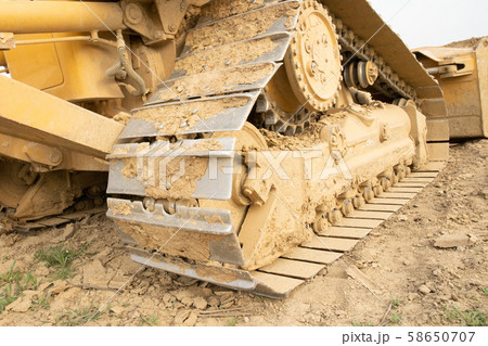 excavator summarizes soil on construction site in dry summer season excavator summarizes soil on construction site in dry summer season 58650707