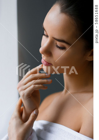 Closeup of a young beautiful woman with nude Closeup of a young beautiful woman with nude 58651688