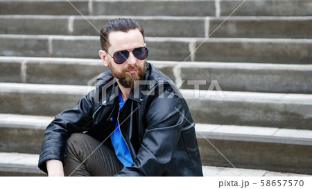 Stylish man on observation deck 58657570